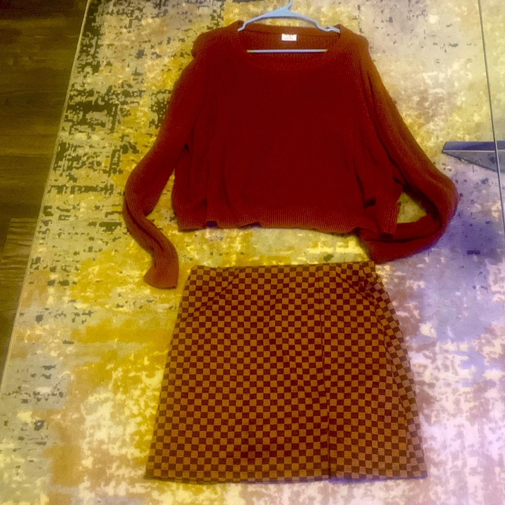 Cute little sweater to go along with mini skirt
